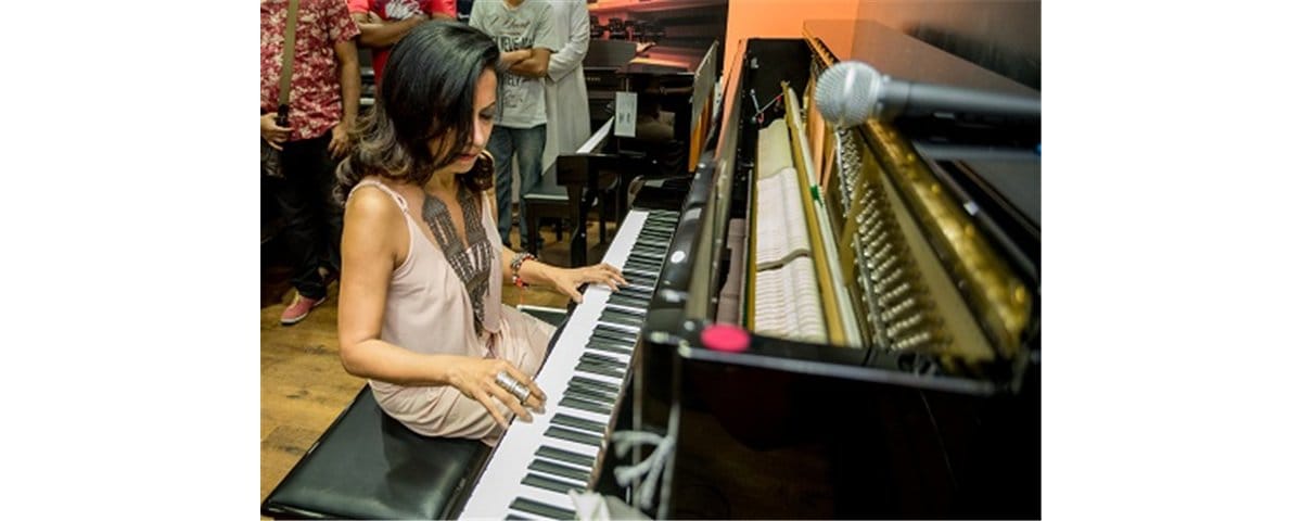 Pianist Ms. Merlin D’Souza playing Yamah Piano