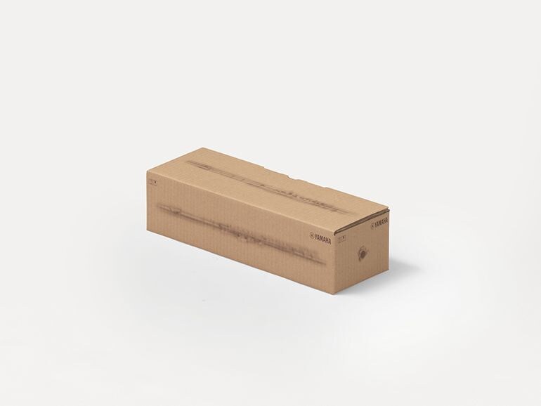 Yamaha cardboard shipping boxes with printed silhouettes of musical instruments.