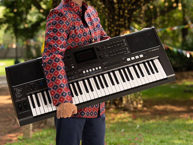 A person carrying the PSR-I610